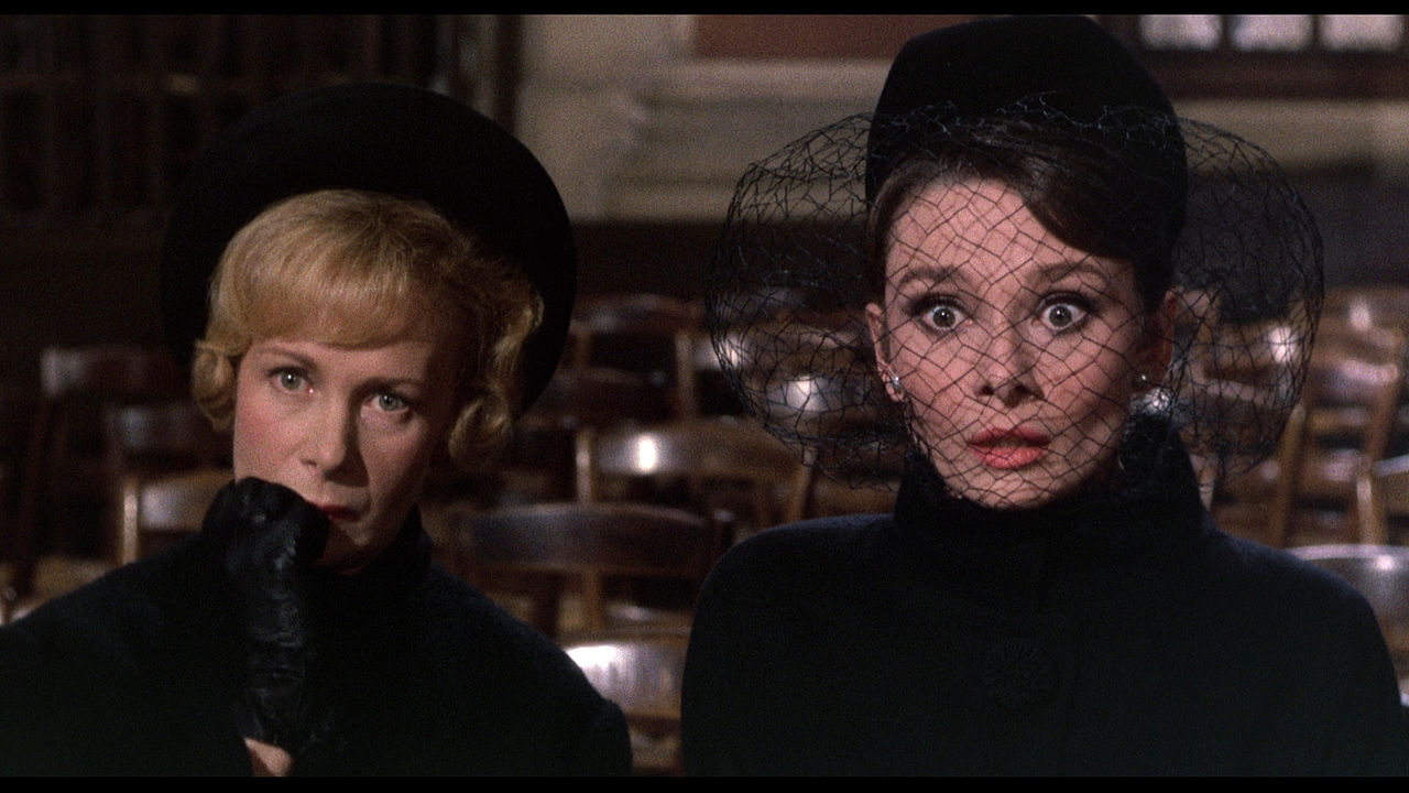 1280px-Charade_1963_Audrey_Hepburn_and_Dominique_Minot